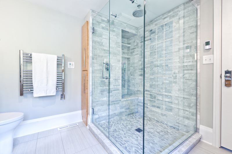 bathroom with walk in shower.