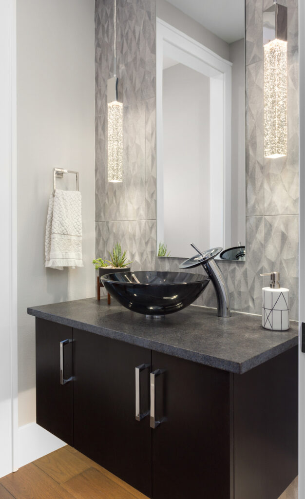 Beautiful Dark Granite Vanity with Black Glass Vessel Sink.