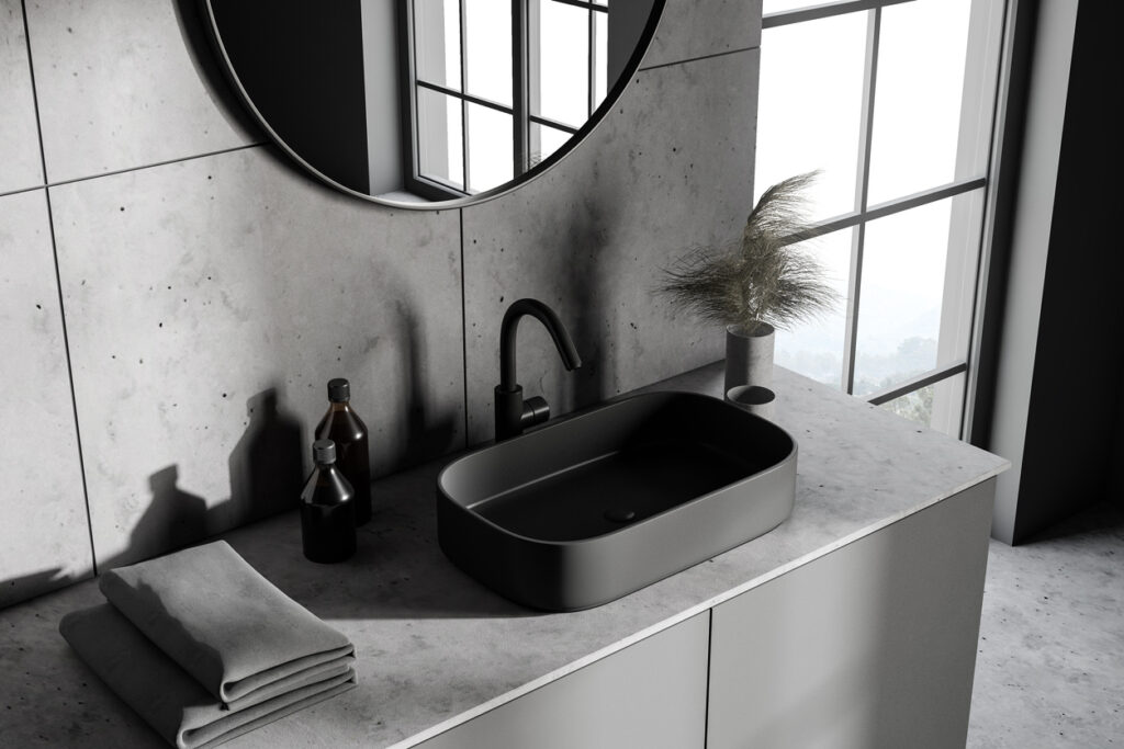 Gray Marble Vanity with Dark Gray Oval Vessel Sink.