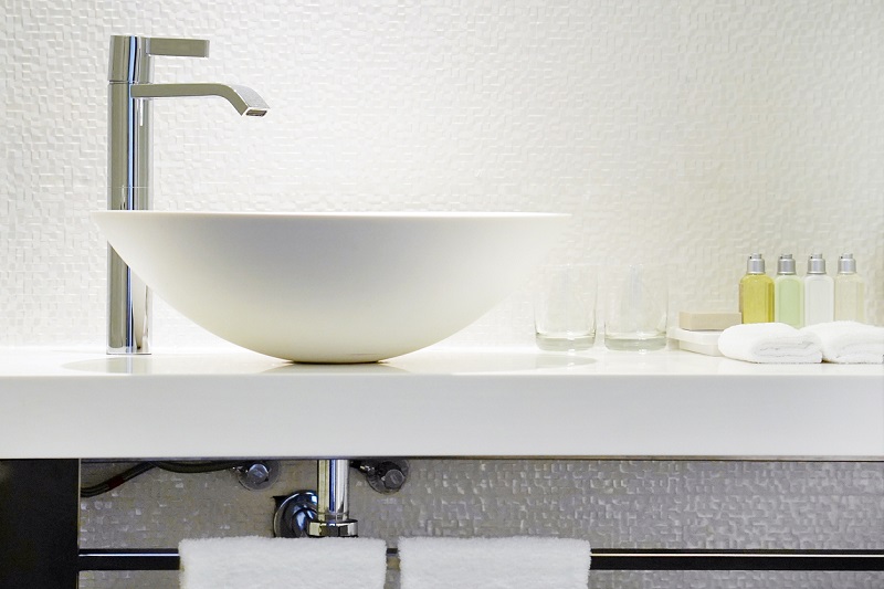 Modern white bathroom sink with faucet