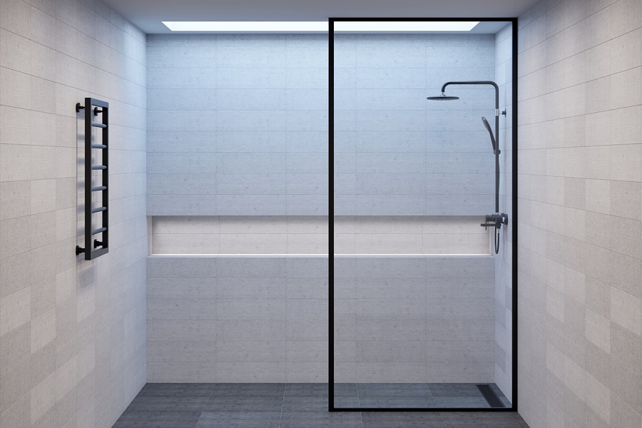 Empty minimalistic shower room with a window in the ceiling, a niche for bath accessories and a heated towel rail. Front view.