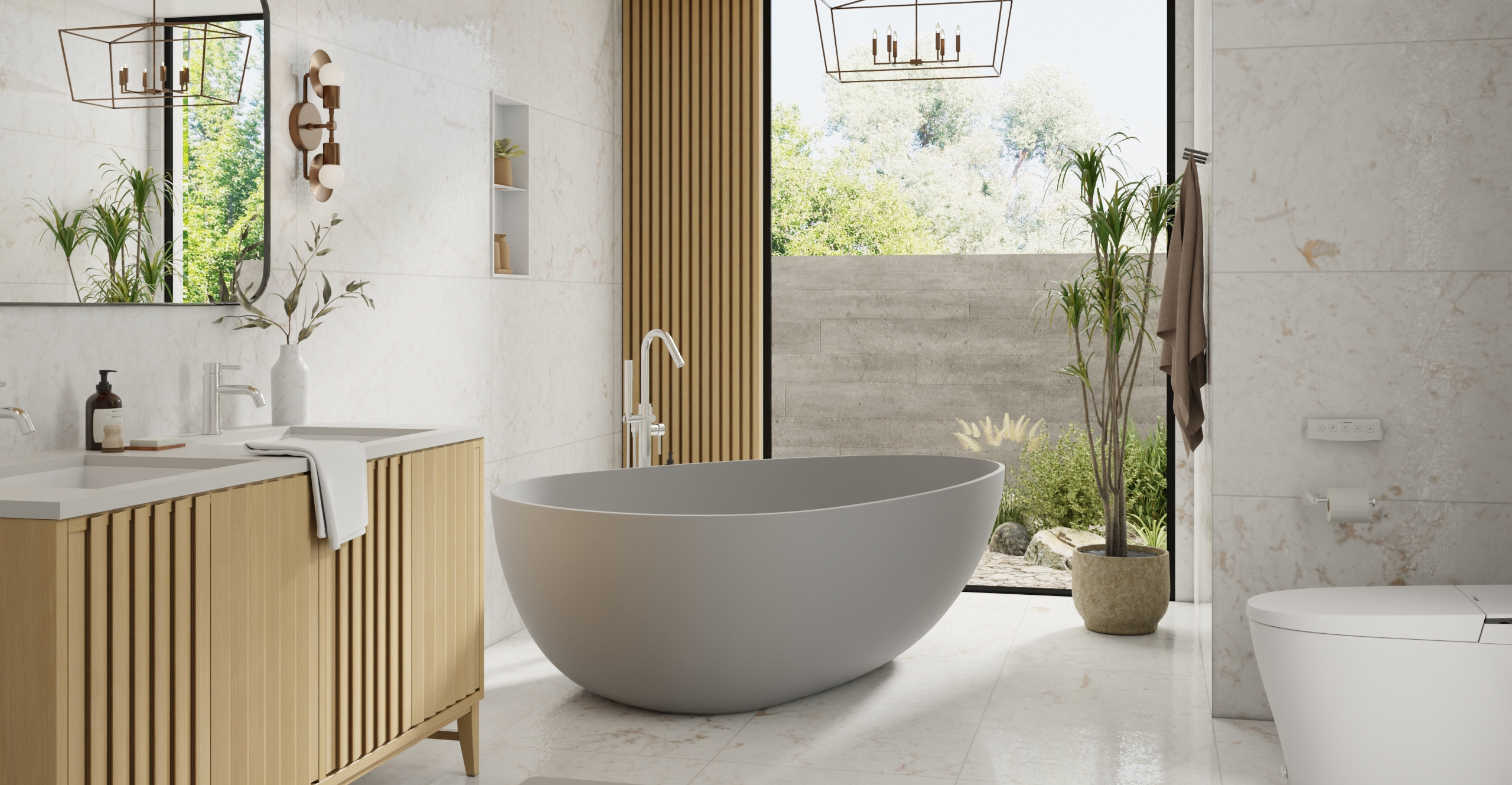 Badeloft BW-01-XXL grey matte freestanding bathtub in contemporary bathroom with gold vanity, round mirror and floor-to-ceiling windows