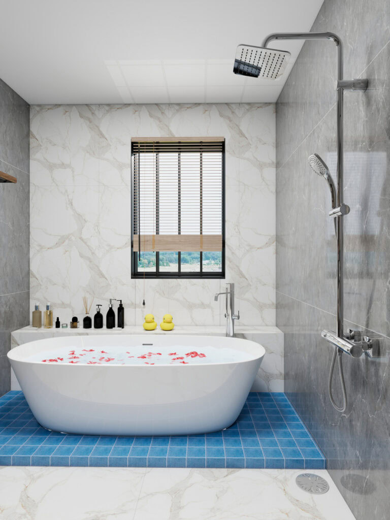 Freestanding bathtub with floral accents, perfect for relaxing baths in a contemporary bathroom desi.